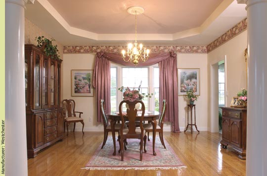 With its tray ceiling, a formal yet welcoming dining room - Manufacturer:  Westchester